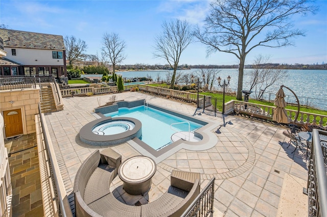 117 Malba Dr, Malba, NY 11357 - view of pool with fence, a water view, a patio, and a pool with connected hot tub