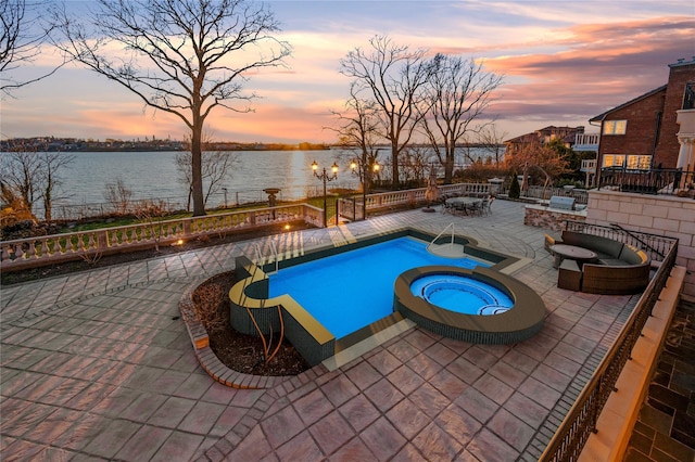 117 Malba Dr, Malba, NY 11357 - view of pool with a pool with connected hot tub, a water view, and a patio