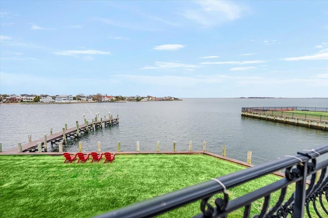 dock area featuring a water view