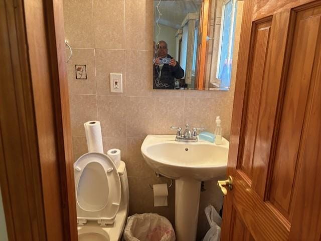 19 Yeoman Dr, East Northport, NY 11731 - bathroom featuring toilet and tile walls