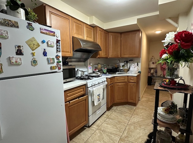 108-14 35th Ave, Corona, NY 11368 - kitchen with white appliances, light countertops, brown cabinets, and a sink