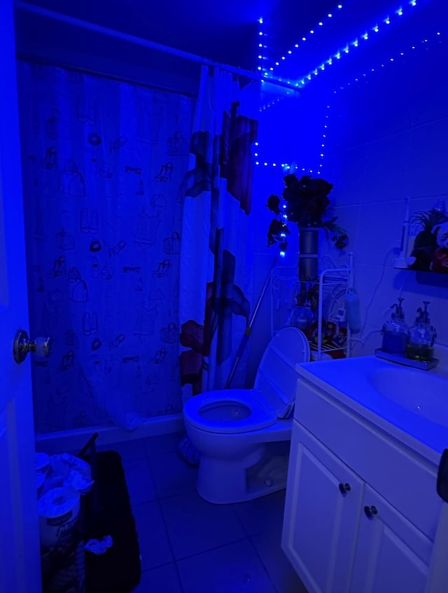 108-14 35th Ave, Corona, NY 11368 - bathroom featuring toilet, tile patterned flooring, vanity, and walk in shower