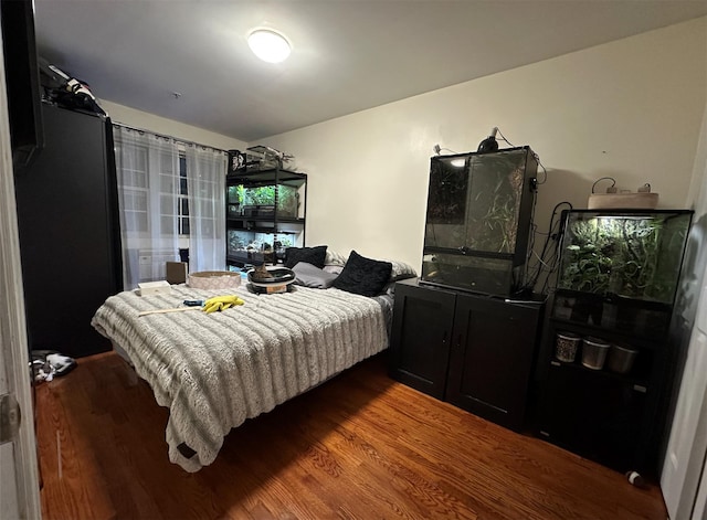 108-14 35th Ave, Corona, NY 11368 - bedroom featuring wood finished floors