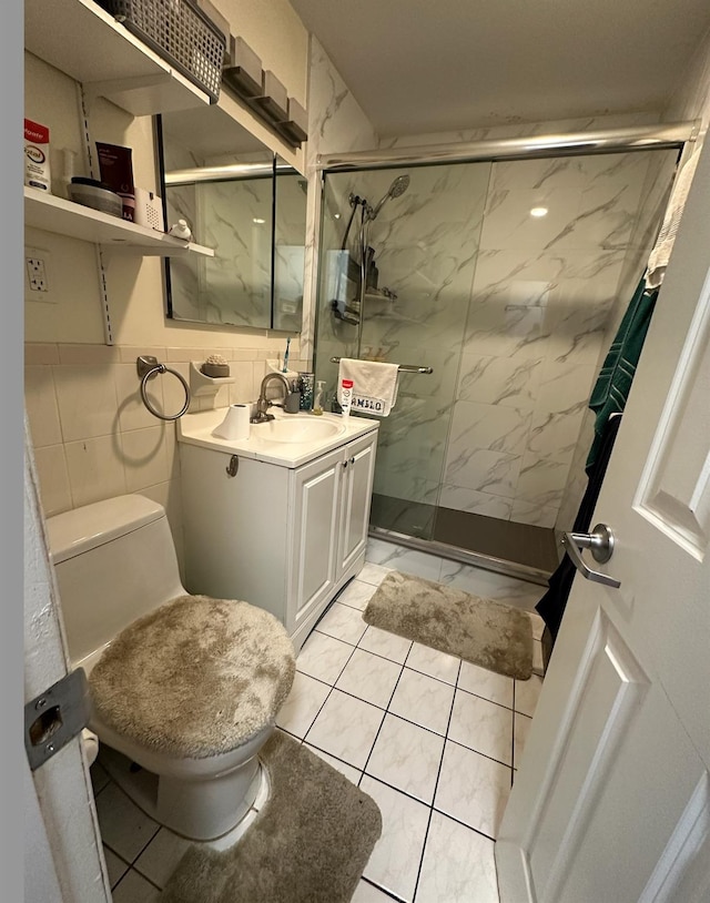 108-14 35th Ave, Corona, NY 11368 - full bath featuring toilet, vanity, a marble finish shower, and tile walls