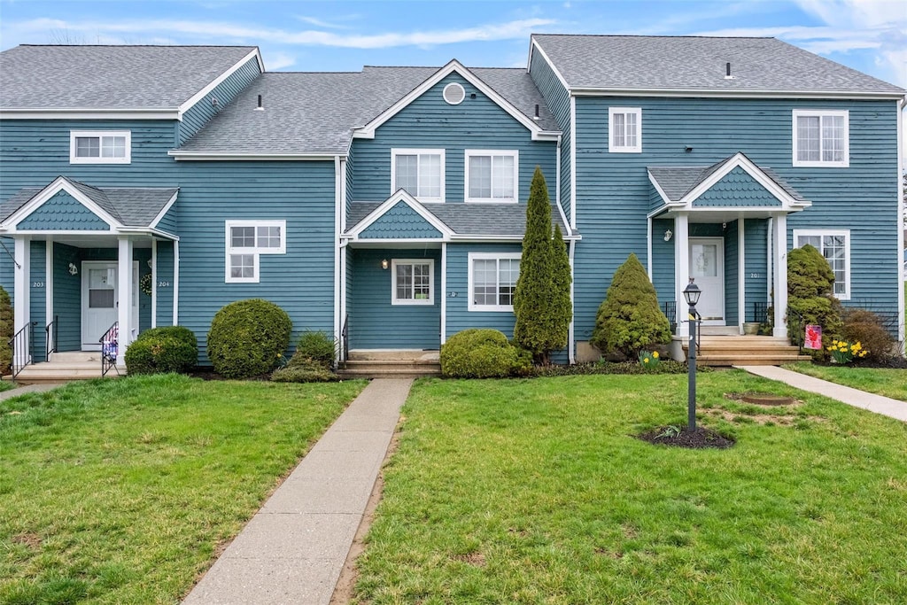 202 Sheffield Ct, Brewster, NY 10509 - view of front of property with a front lawn