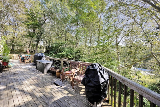 18 Warner Ct, Baiting Hollow, NY 11933 - wooden deck featuring a wooded view, a grill, and a water view