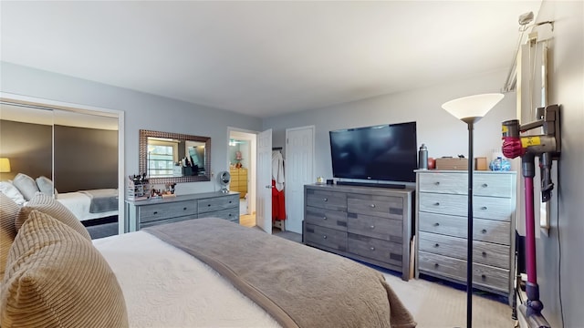 bedroom featuring light colored carpet