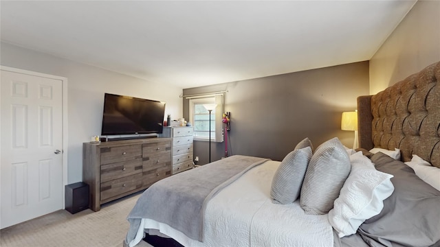 bedroom with light carpet