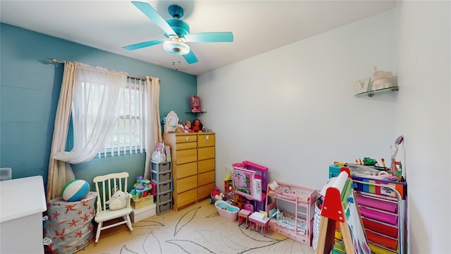 rec room with carpet floors and ceiling fan