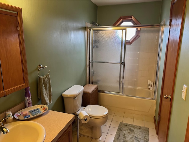 1343 William Floyd Pkwy, Shirley, NY 11967 - bathroom featuring combined bath / shower with glass door, toilet, tile patterned flooring, and vanity