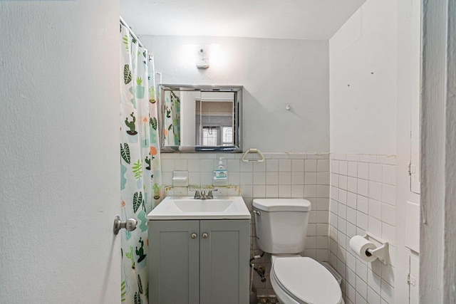 89-15 Parsons Blvd Unit 3J, Jamaica, NY 11432 - bathroom with tile walls, toilet, and vanity