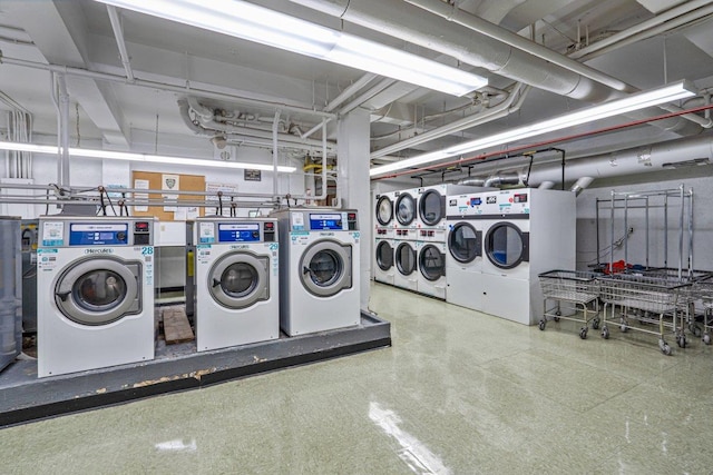 89-15 Parsons Blvd Unit 3J, Jamaica, NY 11432 - common laundry area featuring independent washer and dryer, tile patterned floors, and stacked washer / drying machine