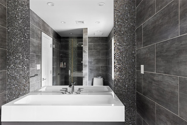full bath featuring vanity, recessed lighting, toilet, visible vents, and tile walls