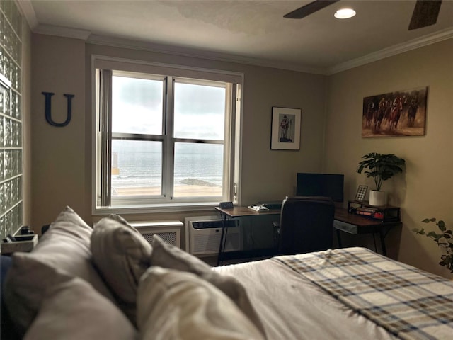 bedroom featuring a wall mounted AC and ornamental molding
