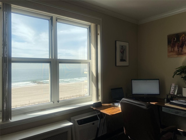 office space with crown molding and radiator heating unit