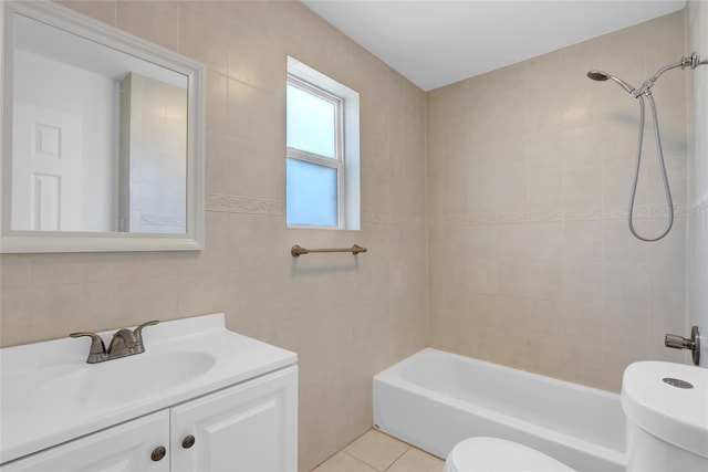 83 Fairview Ave, Islip Terrace, NY 11752 - full bathroom featuring vanity, shower / tub combination, tile patterned flooring, toilet, and tile walls