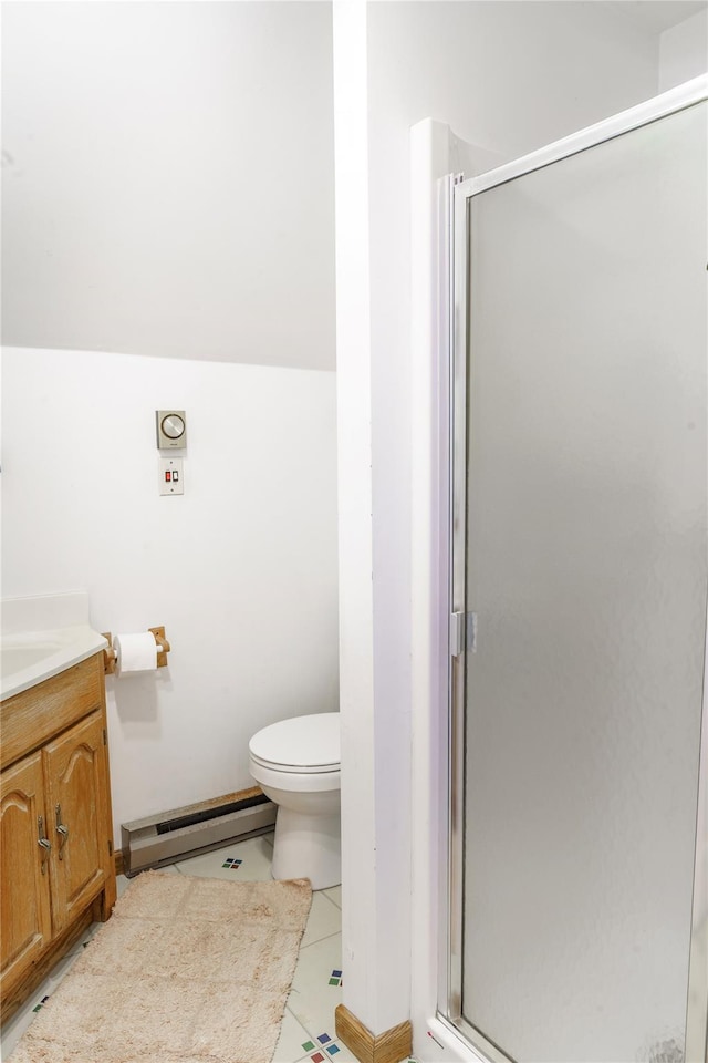 20 Bowers Dr, Hurleyville, NY 12747 - full bathroom with a baseboard heating unit, vanity, a shower stall, and tile patterned flooring