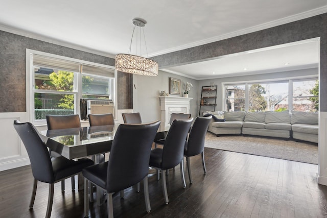 dining room featuring wallpapered walls, crown molding, dark wood-style floors, and cooling unit