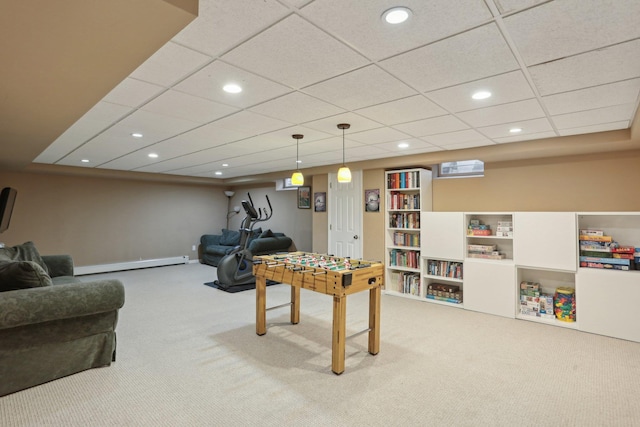 rec room with a baseboard heating unit, carpet flooring, and recessed lighting
