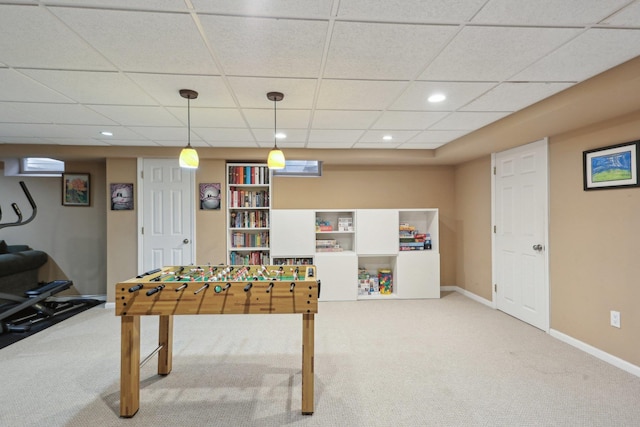 rec room with baseboards, carpet, recessed lighting, and a drop ceiling