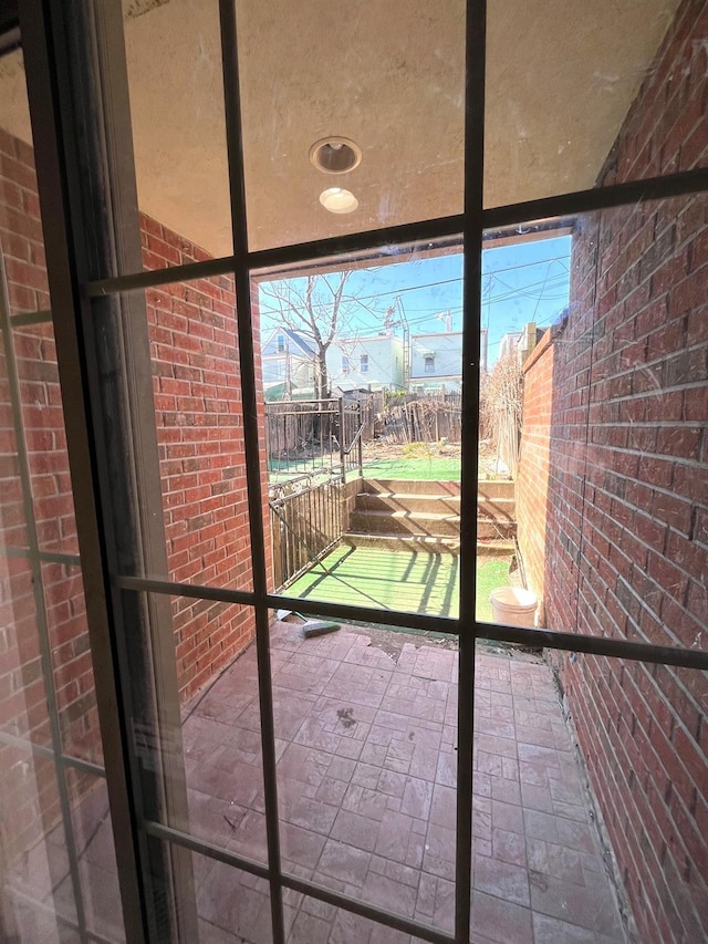 104-27 38th Ave Unit 1B, Corona, NY 11368 - doorway to outside with brick wall