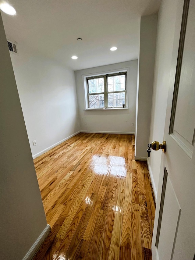 104-27 38th Ave Unit 1B, Corona, NY 11368 - spare room with light wood-style floors, baseboards, visible vents, and recessed lighting