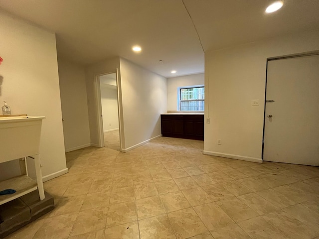 104-27 38th Ave Unit 1B, Corona, NY 11368 - interior space with light tile patterned flooring, baseboards, and recessed lighting