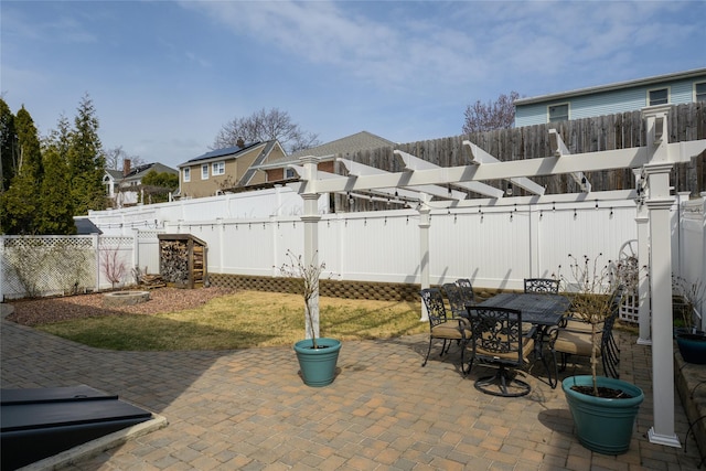 view of patio / terrace with a fenced backyard and outdoor dining area