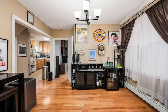 1290 Edison Ave, Bronx, NY 10461 - interior space with baseboard heating and light wood-style flooring