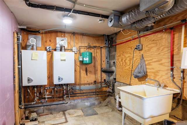 1290 Edison Ave, Bronx, NY 10461 - utility room featuring tankless water heater and a sink