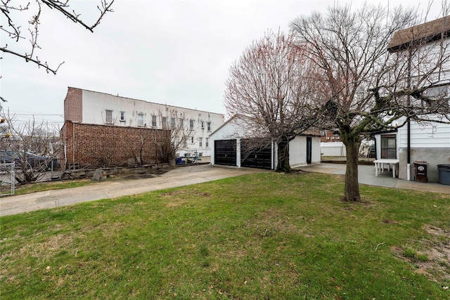 1290 Edison Ave, Bronx, NY 10461 - view of front of house with an outbuilding, fence, and a front lawn