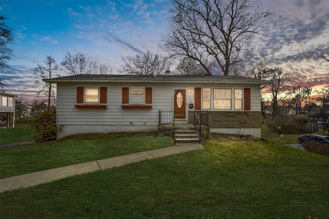 view of front of home with a front lawn