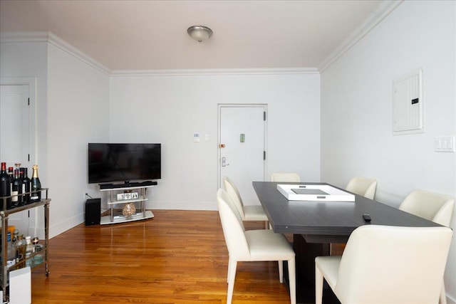710 Riverside Dr Unit 6B, New York Manhattan, NY 10031 - dining space with wood finished floors, crown molding, electric panel, and baseboards