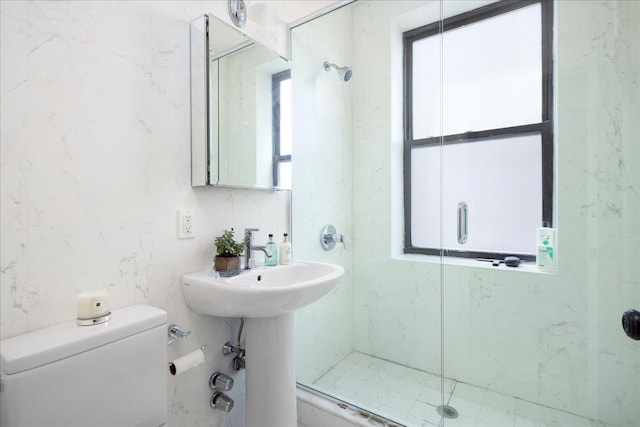 710 Riverside Dr Unit 6B, New York Manhattan, NY 10031 - bathroom with tile walls, a stall shower, toilet, and a sink