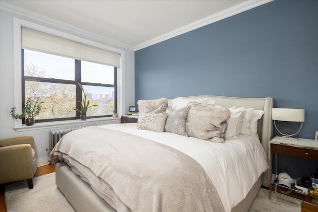 710 Riverside Dr Unit 6B, New York Manhattan, NY 10031 - bedroom featuring wood finished floors, baseboards, ornamental molding, and radiator