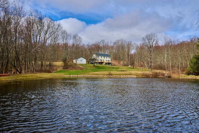 water view featuring a wooded view