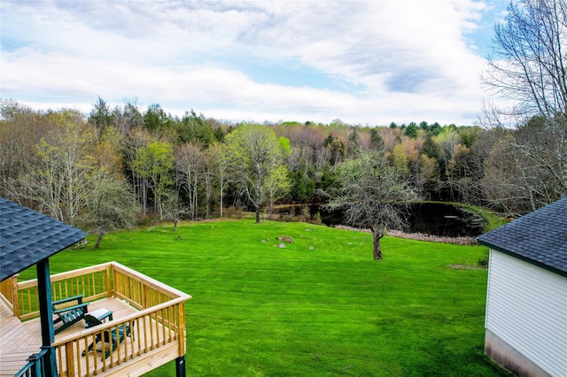 view of yard featuring a wooden deck