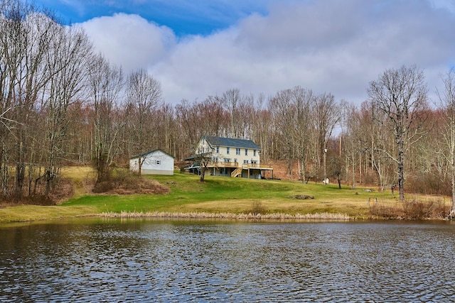 property view of water with a wooded view