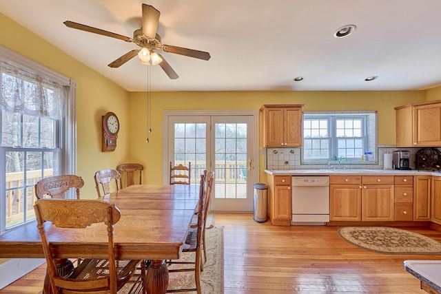 dining room with light wood-type flooring, recessed lighting, and ceiling fan