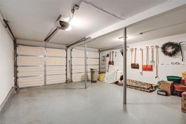 garage featuring a garage door opener