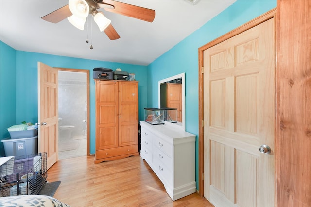 91 Meyerhoff Rd, Hurleyville, NY 12747 - bedroom with ensuite bathroom, a ceiling fan, and light wood-style floors