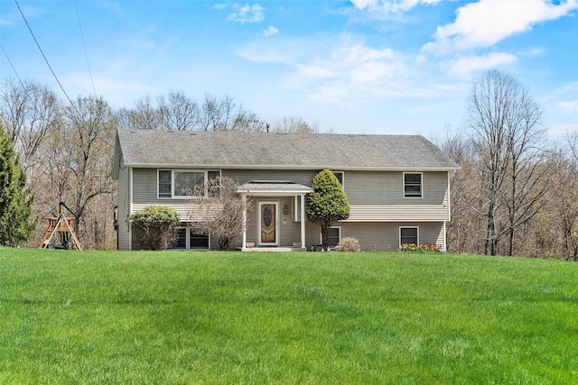 bi-level home with a front yard