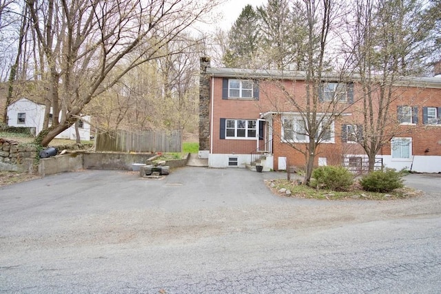9 Old Albany Post Rd N, Cold Spring, NY 10516 - exterior space featuring entry steps, a chimney, and brick siding