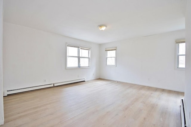 9 Old Albany Post Rd N, Cold Spring, NY 10516 - empty room featuring baseboards, wood finished floors, and a baseboard radiator