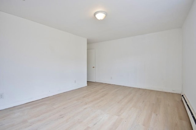 9 Old Albany Post Rd N, Cold Spring, NY 10516 - spare room featuring a baseboard heating unit and light wood finished floors