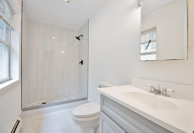 9 Old Albany Post Rd N, Cold Spring, NY 10516 - full bathroom featuring a baseboard heating unit, walk in shower, vanity, and toilet