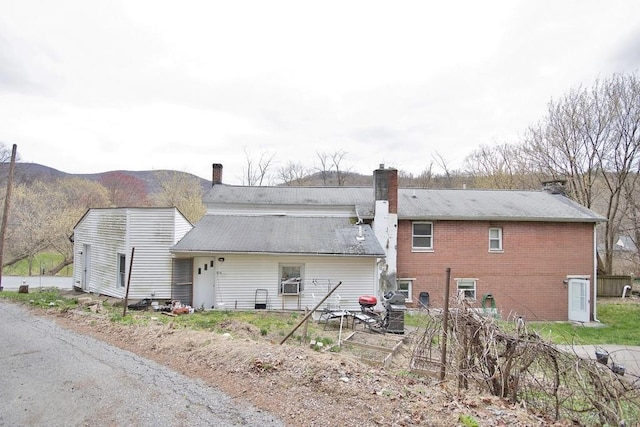 9 Old Albany Post Rd N, Cold Spring, NY 10516 - back of property featuring a chimney and a mountain view