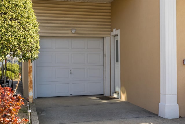garage featuring driveway