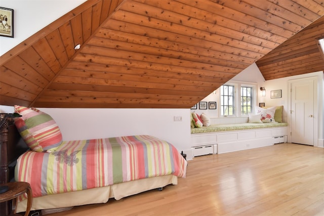 bedroom with wood ceiling, baseboard heating, vaulted ceiling, and light wood finished floors