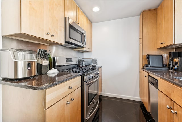 4-74 48th Ave Unit Ph4D, Long Island City, NY 11109 - kitchen featuring appliances with stainless steel finishes, baseboards, dark stone counters, light brown cabinetry, and recessed lighting